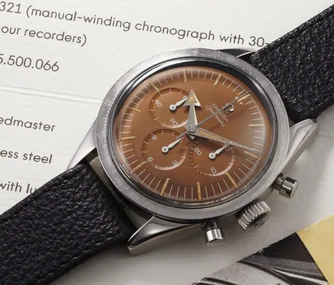 encheres omega fausse montre une min